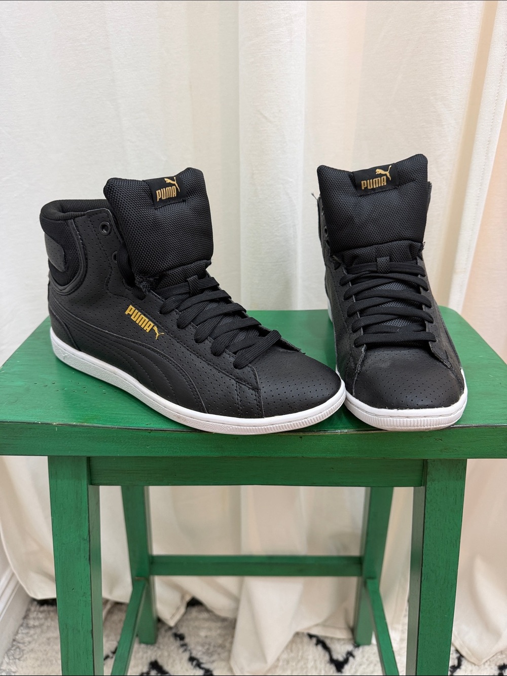 Puma Black High-Top Sneakers with Gold Logo